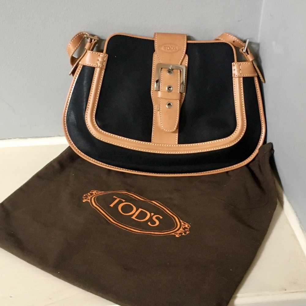 Tod’s waxed canvas and leather buckle bag